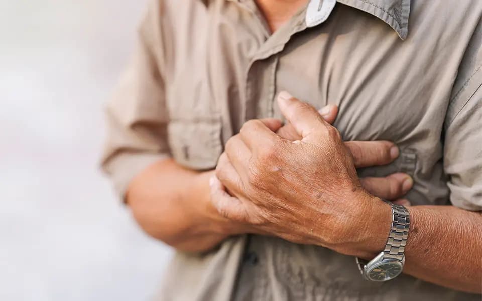 Person holding chest