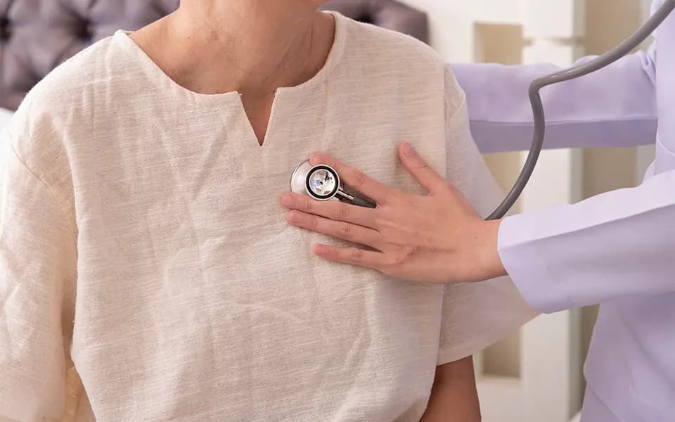 Patient getting their breathing checked