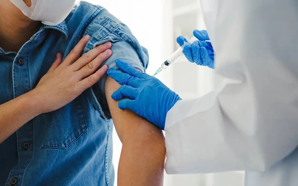 Image of person getting a shot