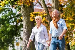 Senior man and woman embracing each other in love
