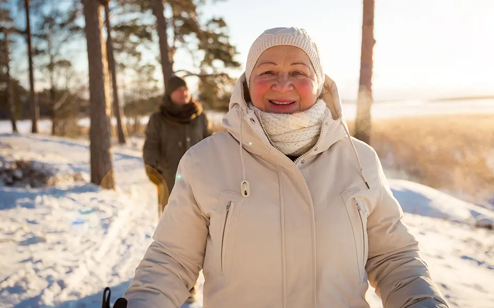 senior woman bundled up on cold day