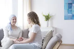Smiling mother with cancer